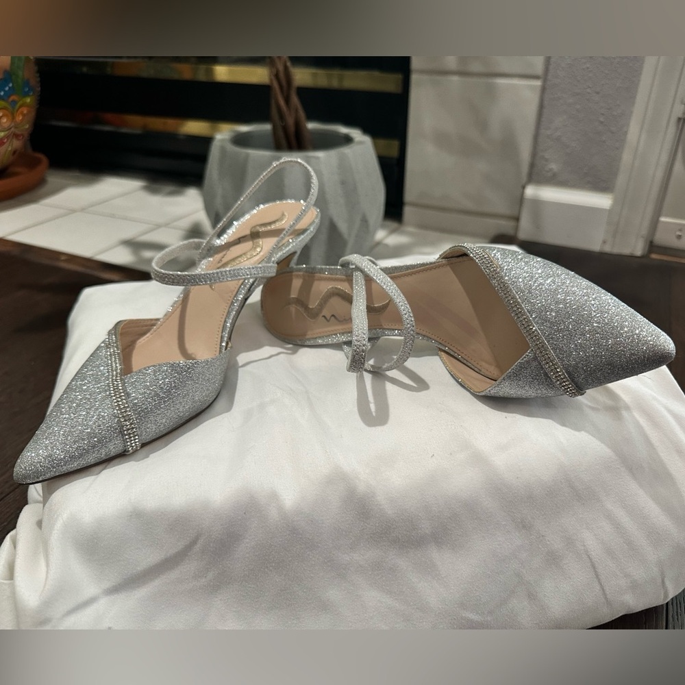 Glamour and ease go together in BECKIE by Nina silver glitter kitten heel